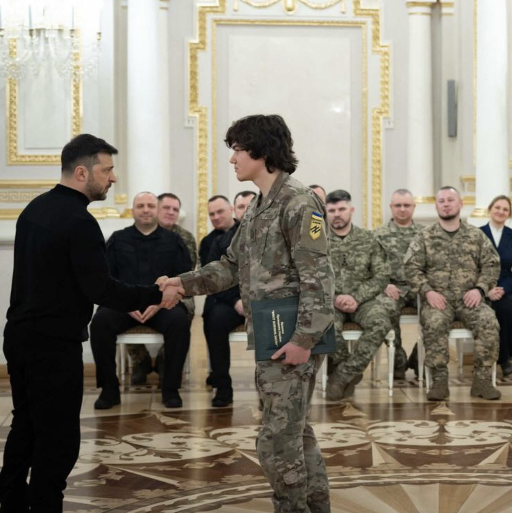Azov Brigade soldiers shaking hands with President Zelenskyy of Ukraine