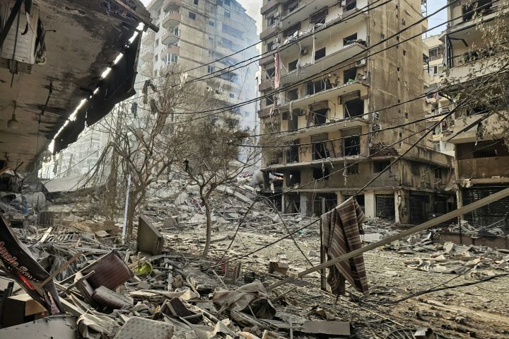 Israeli airstrike aftermath in Beirut southern suburb representing analysis of Israel's wars in Gaza, Lebanon, and Iran and the Greater Israel project