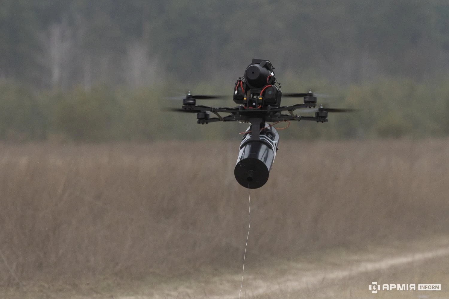 fpv drone holding a ammuniation
