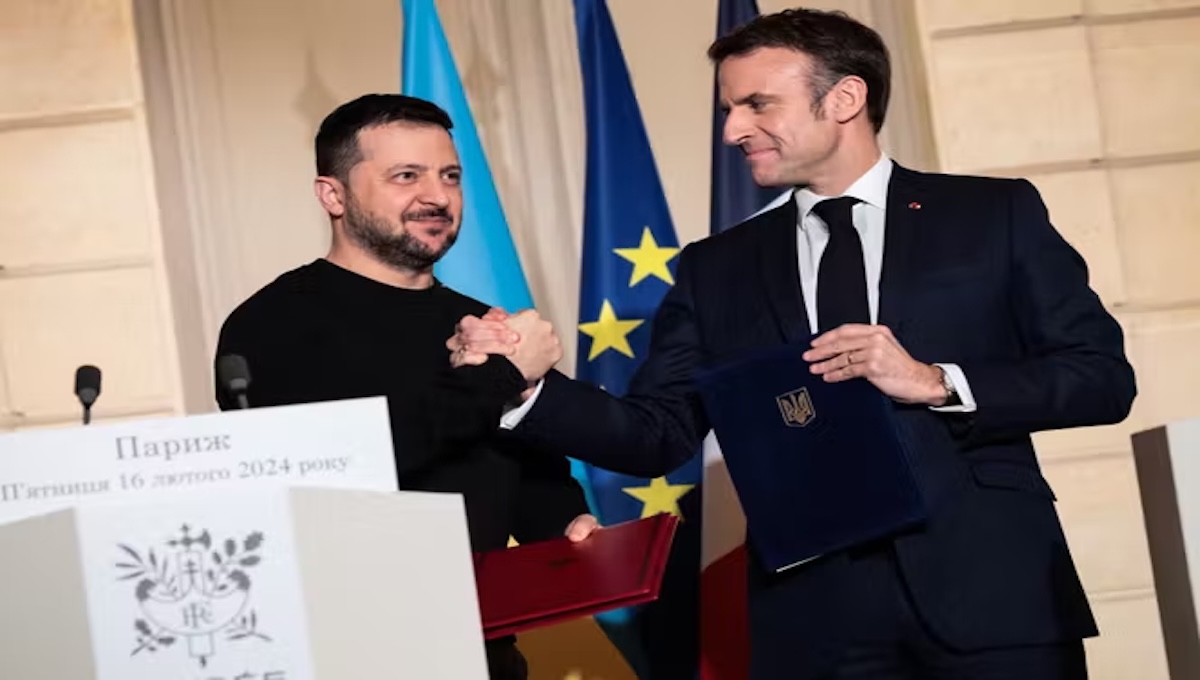Zelensky and Macron shaking hands as Ukraine shifts intelligence reliance from the U.S. to France
