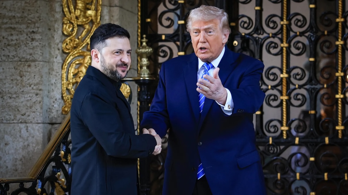 Trump and Zelensky shaking hands at Mar-a-Lago during security guarantee negotiations